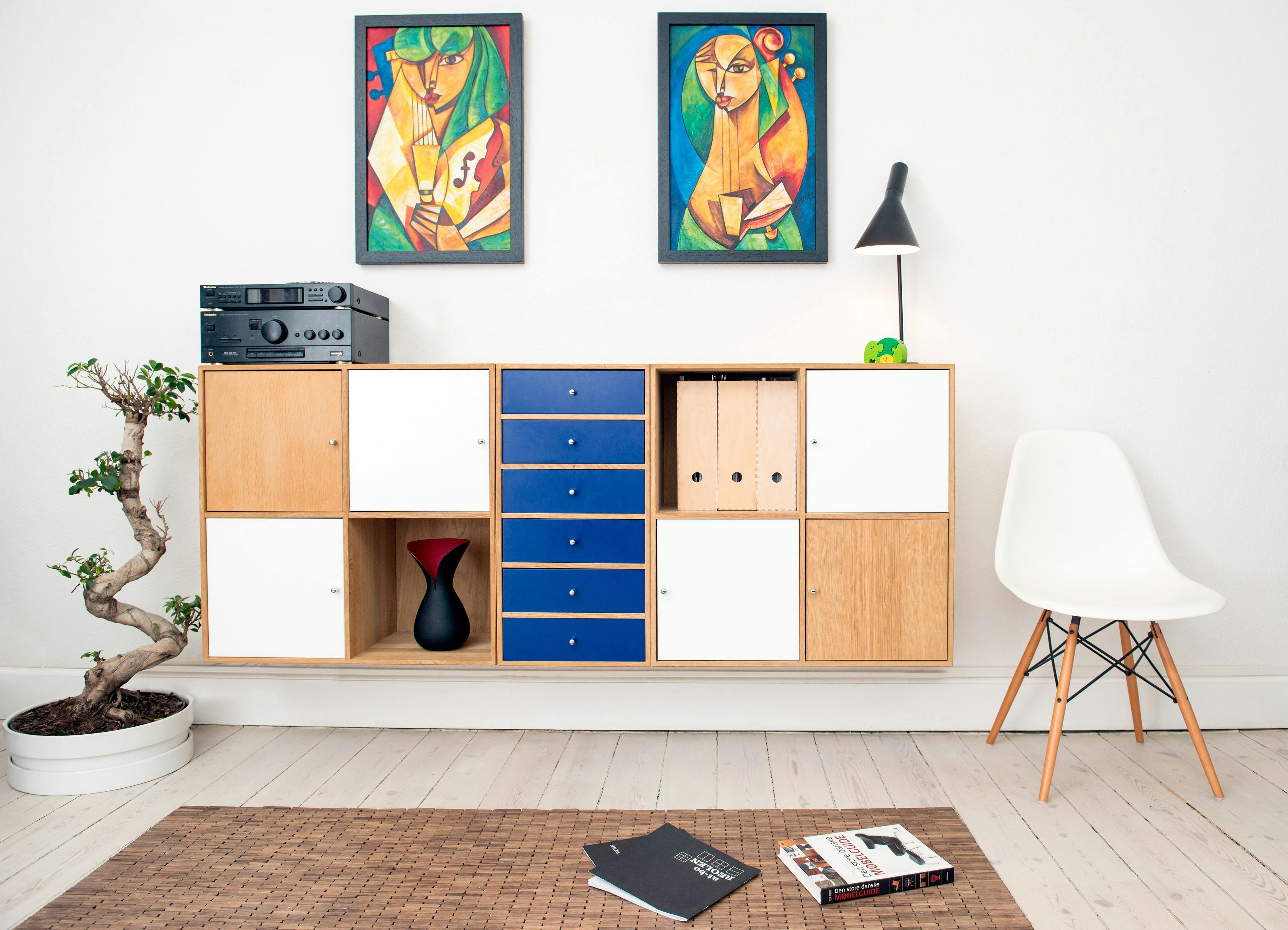 A professional handyman assembling flat-pack furniture accurately with proper tools.